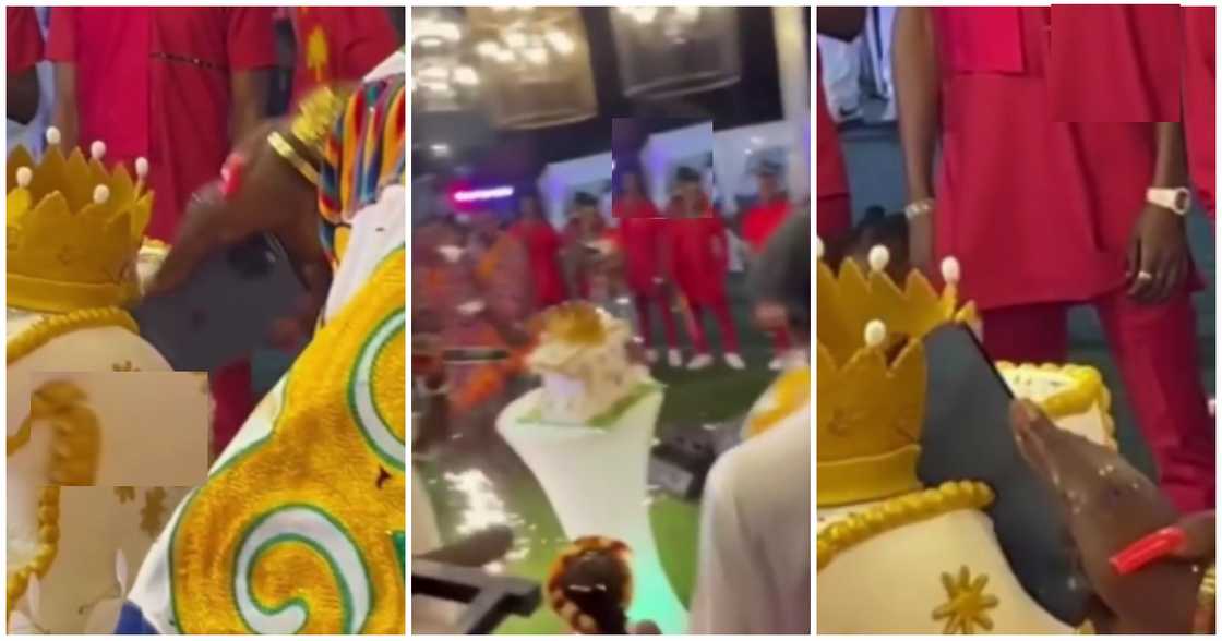 Ghanaian Man Causes Stir As He Cuts Huge Birthday Cake With iPhone 13 in Video Ghanaian Man Causes Stir As He Cuts Huge Birthday Cake With iPhone 13 in Video