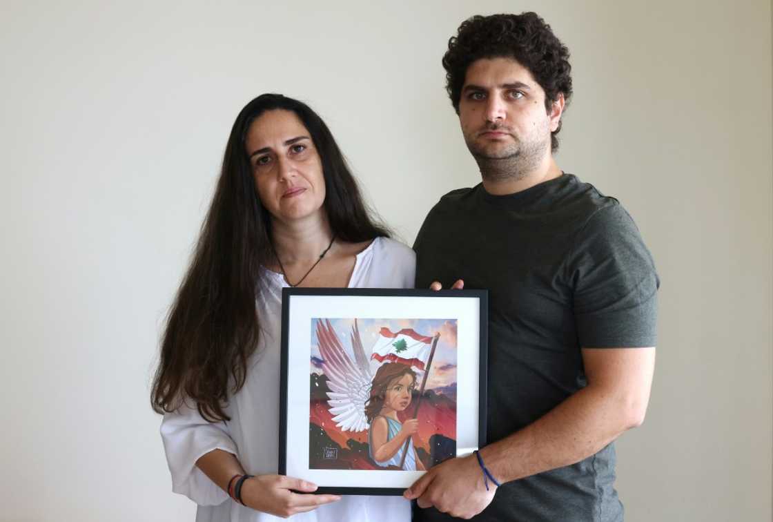 Paul and Tracy Naggear hold a framed drawing for their late daughter Alexandra, who was killed in the Beirut port blast of August 2020 Paul and Tracy Naggear hold a framed drawing for their late daughter Alexandra, who was killed in the Beirut port blast of August 2020