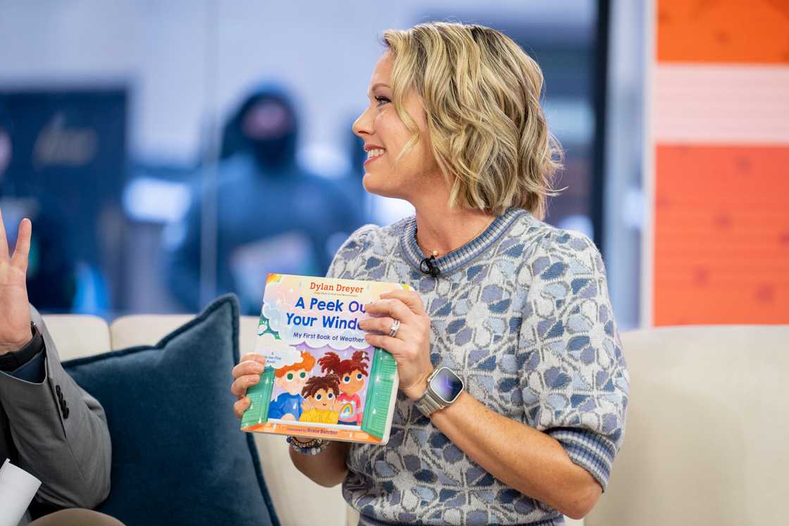 Dylan Dreyer holds her book Dylan Dreyer holds her book