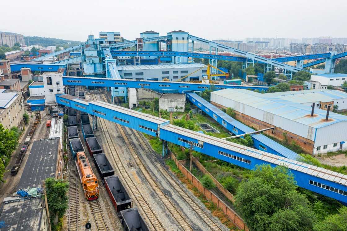 A coal mine in Pingdingshan, in China's central Henan province -- Chinese authorities ordered coal producers to add 300 million tonnes of mining capacity in 2022 A coal mine in Pingdingshan, in China's central Henan province -- Chinese authorities ordered coal producers to add 300 million tonnes of mining capacity in 2022