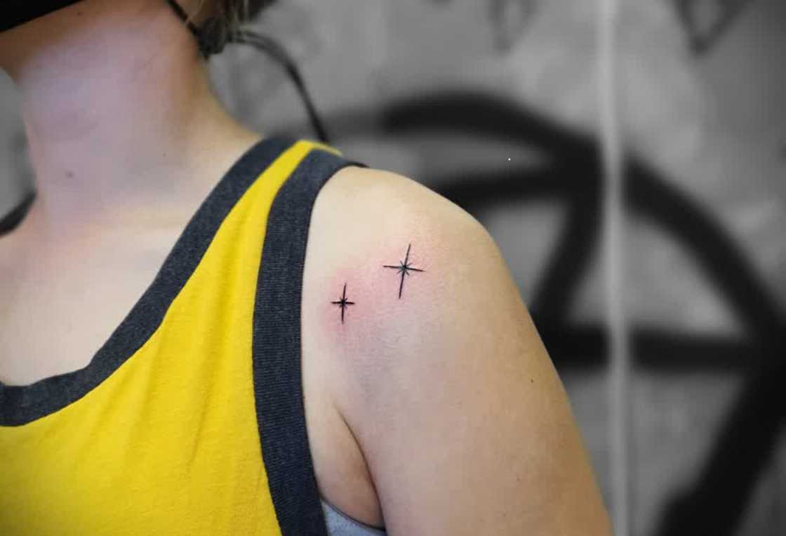 Front shoulder Peter Pan star tattoo Front shoulder Peter Pan star tattoo