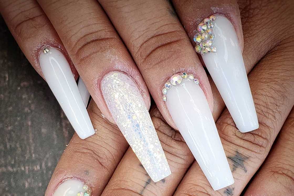 White nails with design White nails with design