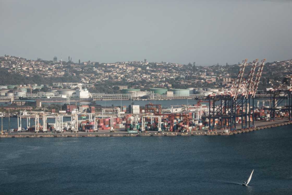 Dozens of container ships are stuck outside Durban port as bad weather and systems breakdowns hit its operations Dozens of container ships are stuck outside Durban port as bad weather and systems breakdowns hit its operations