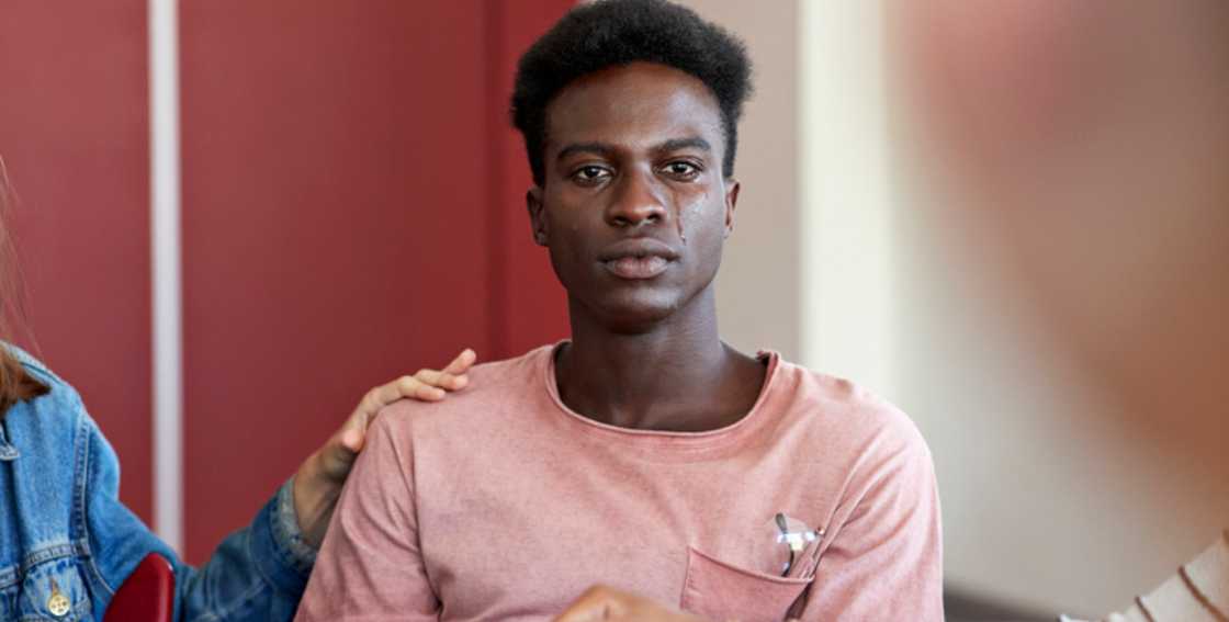 African man looking sad African man looking sad