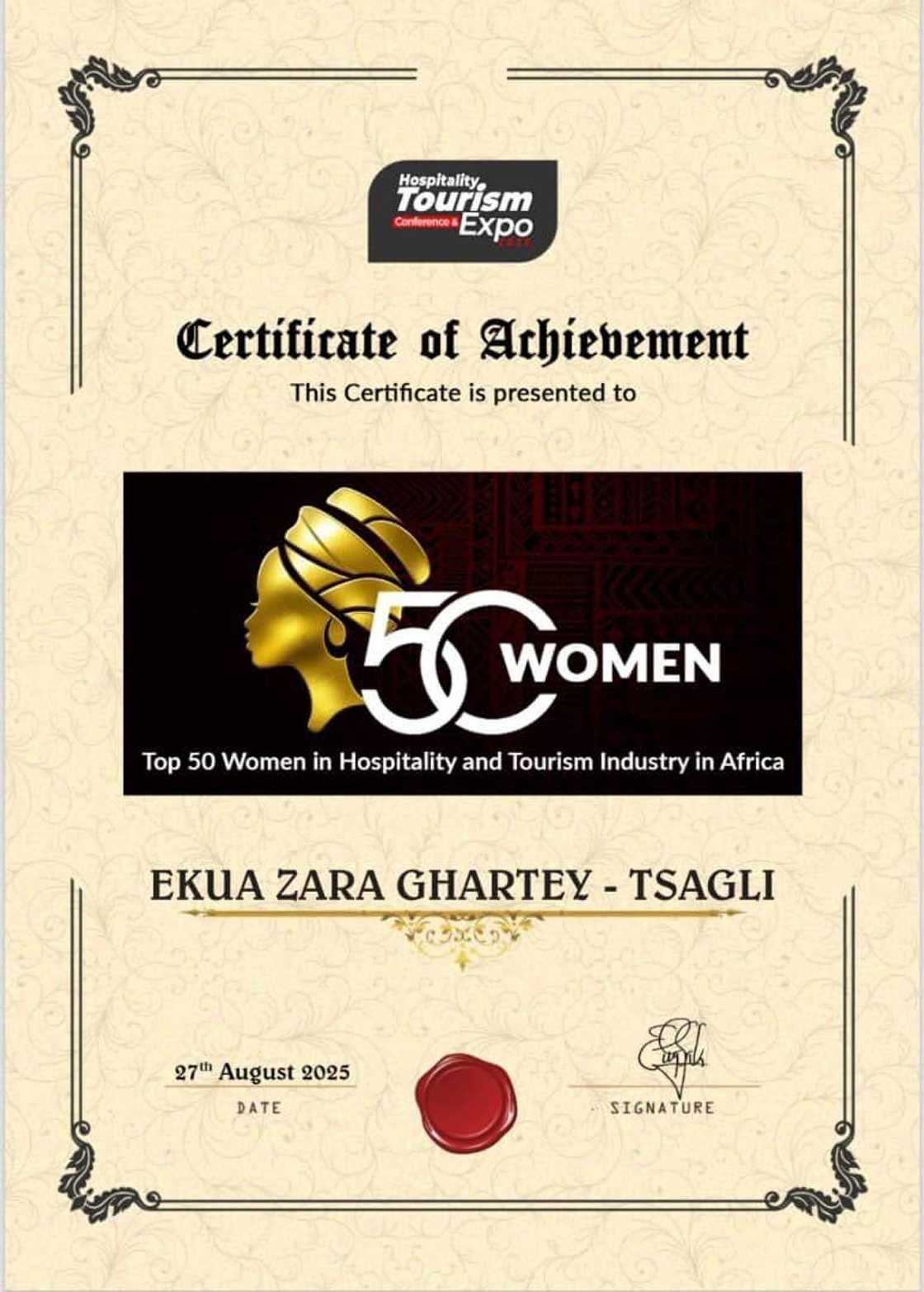 A certificate of achievement with a gold head and red seal presented to Mrs. Ekua Zara Ghartey-Tsagli A certificate of achievement with a gold head and red seal presented to Mrs. Ekua Zara Ghartey-Tsagli