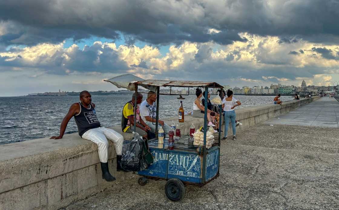 The island nation has been battered by the fallout from the coronavirus pandemic on the key tourism industry, the tightening of US sanctions in recent years, and structural economic weaknesses The island nation has been battered by the fallout from the coronavirus pandemic on the key tourism industry, the tightening of US sanctions in recent years, and structural economic weaknesses