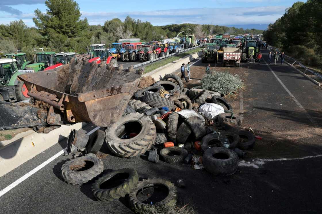 'You shall not pass': Catalan farmers blocked the AP-7 motorway linking Spain and France with tractors and tyres 'You shall not pass': Catalan farmers blocked the AP-7 motorway linking Spain and France with tractors and tyres