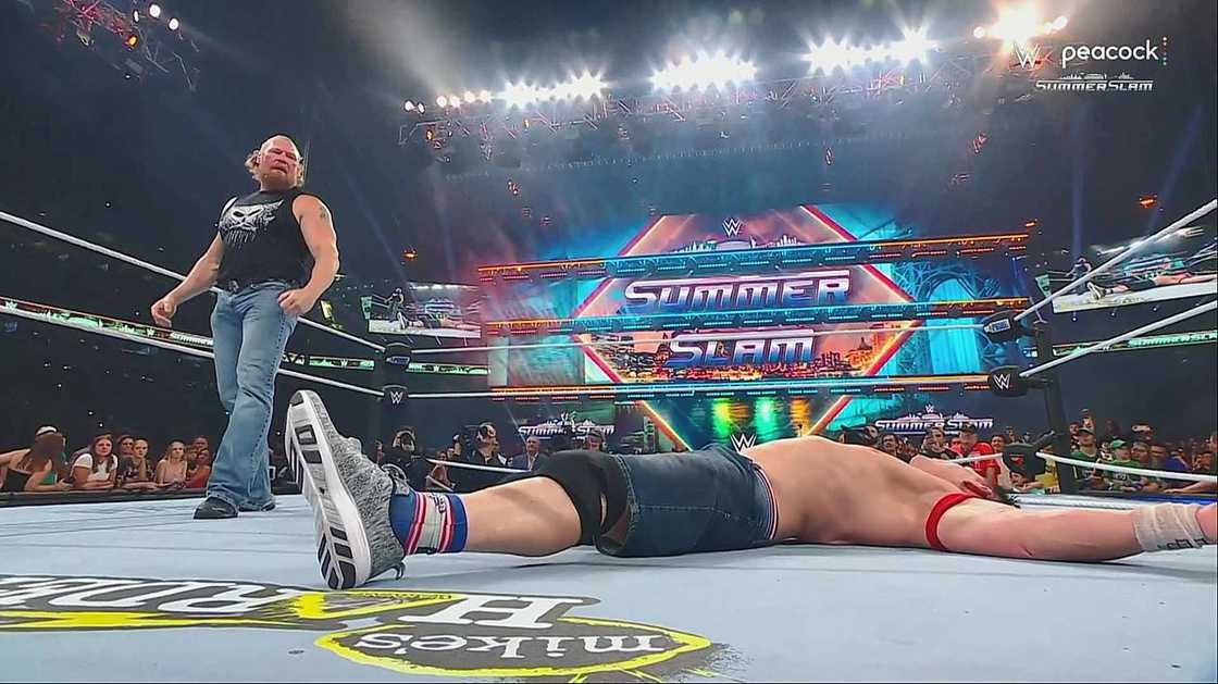 Brock Lesnar attacks John Cena, Lesnar knocks John Cena, SummerSlam 2025, Brock Lesnar, John Cena Brock Lesnar attacks John Cena, Lesnar knocks John Cena, SummerSlam 2025, Brock Lesnar, John Cena