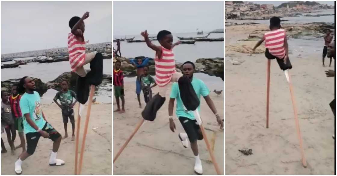 Photos from video of Ghanaian boy being taught to walk with long sticks Photos from video of Ghanaian boy being taught to walk with long sticks
