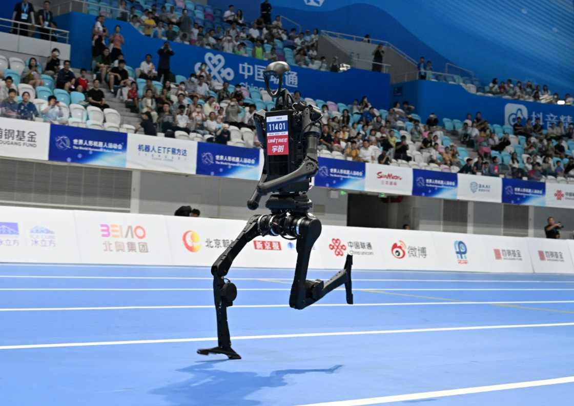 A robot competes in the 1500M race on Friday A robot competes in the 1500M race on Friday
