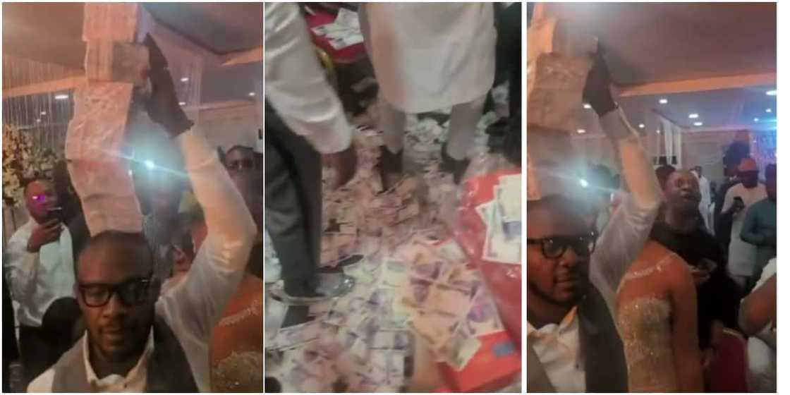 Money rained heavily on stage at a Nigerian party Money rained heavily on stage at a Nigerian party