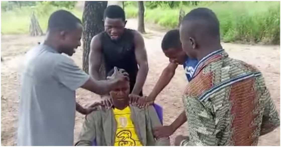 Boy with hearing and speech impairment being prayed for