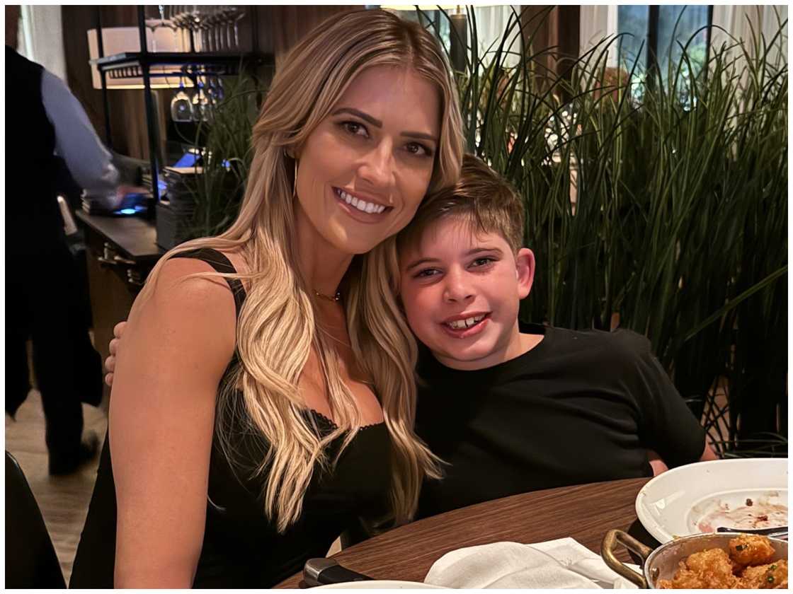 Christina Hall and Brayden in a restaurant