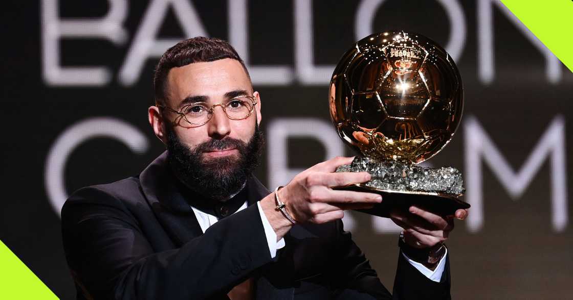 Karim Benzema with the Ballon d'Or award. Karim Benzema with the Ballon d'Or award.