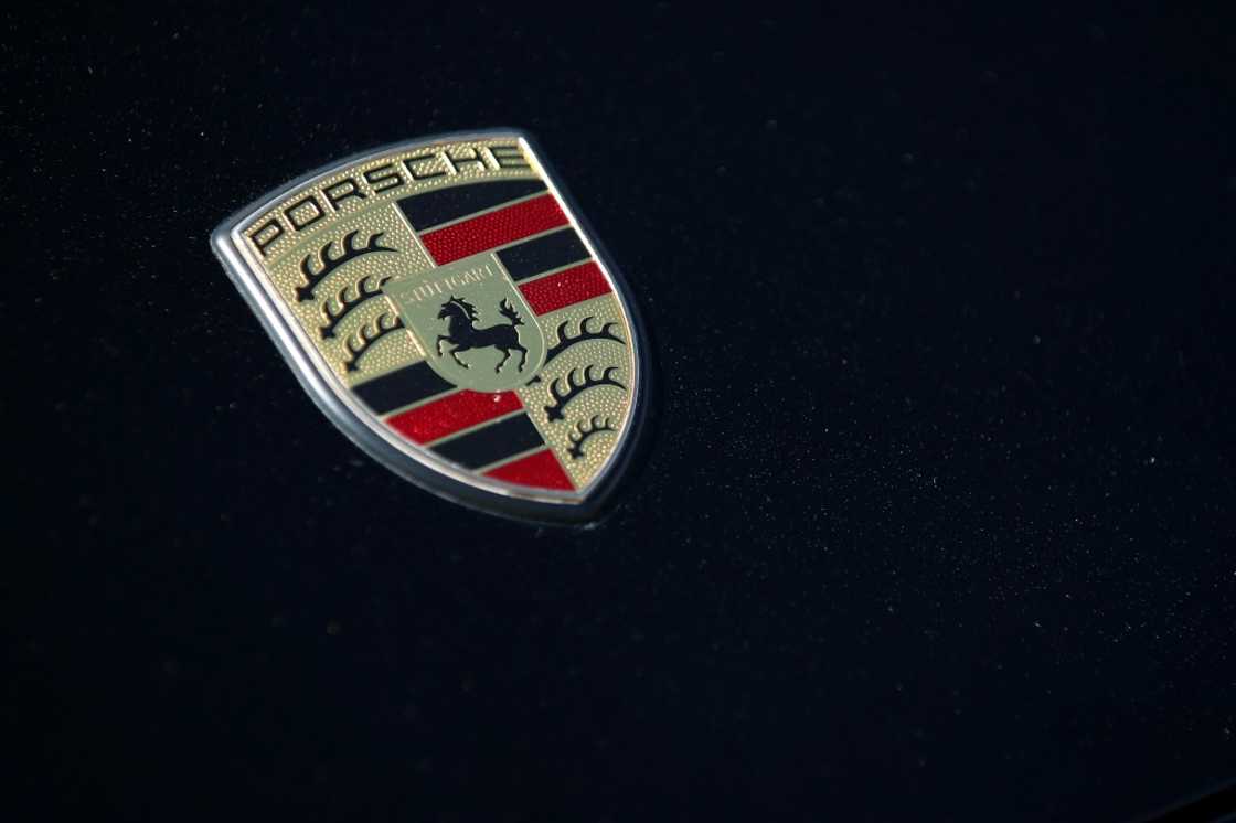 Porsche has said it will delay the introduction of some fully electric cars and extend the life of some combustion engine and hybrid models Porsche has said it will delay the introduction of some fully electric cars and extend the life of some combustion engine and hybrid models
