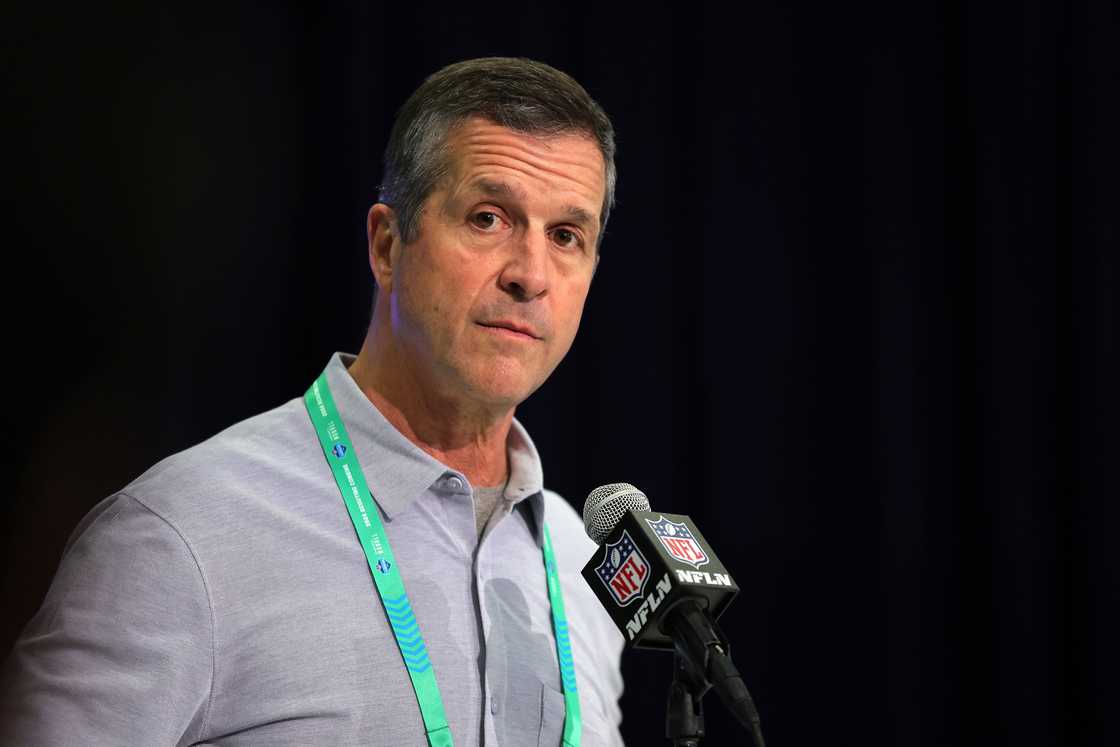 John Harbaugh of the Baltimore Ravens speaks to the media during the NFL Combine John Harbaugh of the Baltimore Ravens speaks to the media during the NFL Combine