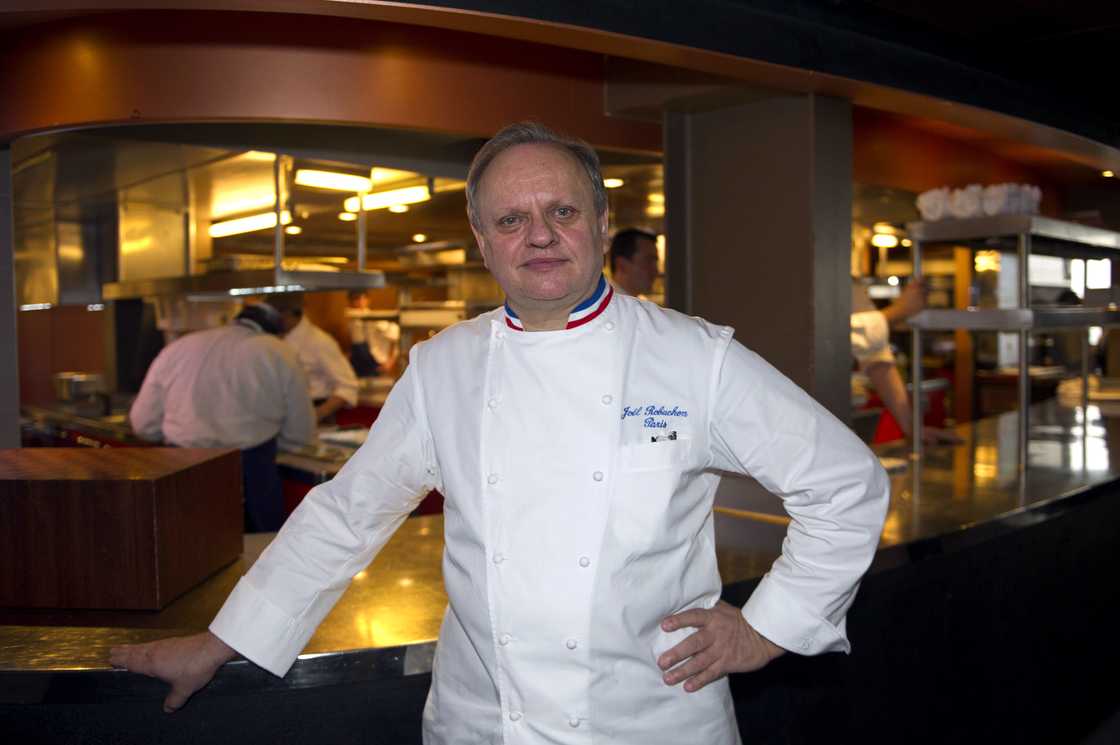 Joël Robuchon poses after a press conference of France's culinary college