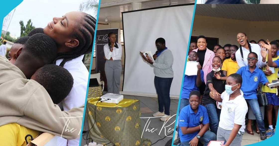 Yvonne Nelson poses with some pupils at St. Martin De Porres