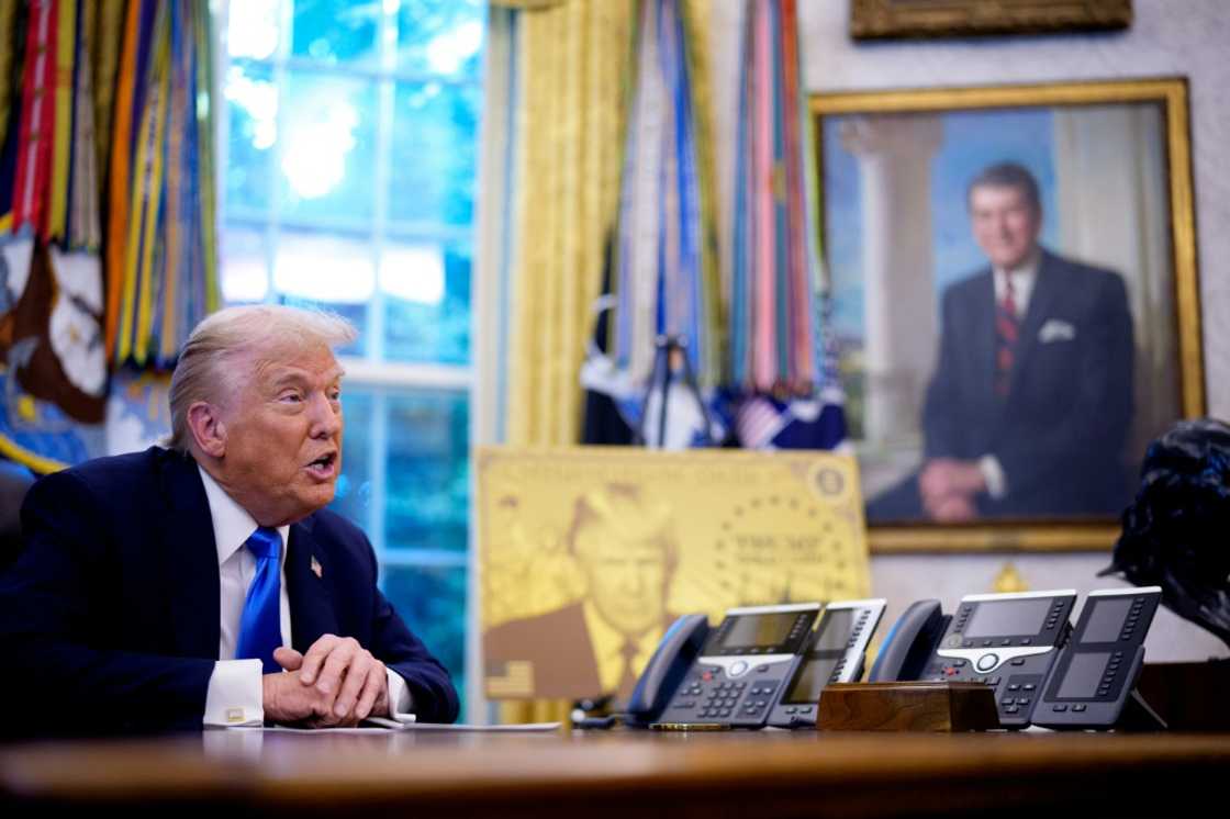 US President Donald Trump speaks in the Oval Office at the White House before signing executive orders that included one introducing a $100,000 fee for H-1B visas US President Donald Trump speaks in the Oval Office at the White House before signing executive orders that included one introducing a $100,000 fee for H-1B visas