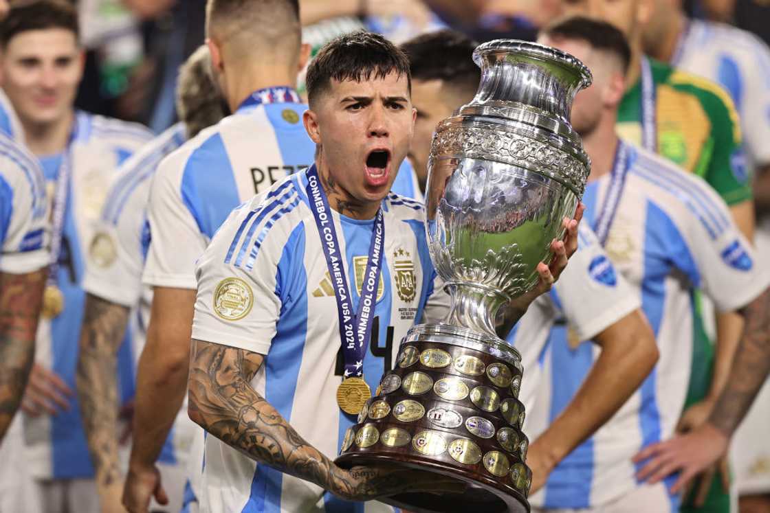 Enzo Fernandez celebrates with 2024 Copa America trophy Enzo Fernandez celebrates with 2024 Copa America trophy