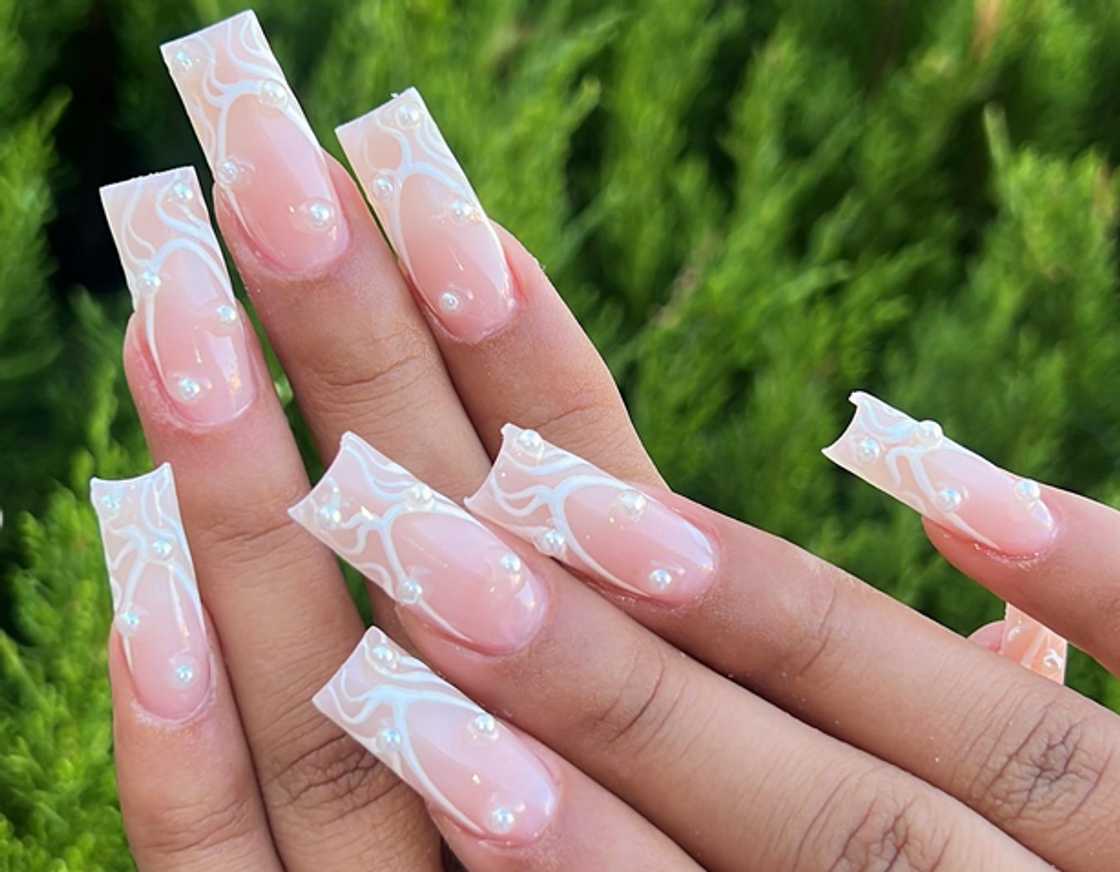 Square milky nails with swirls Square milky nails with swirls