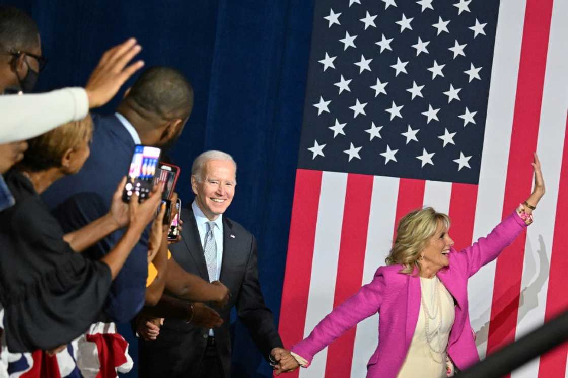 US President Joe Biden and First Lady Jill Biden arrive for an election eve rally at Bowie State University in Maryland on November 7, 2022 US President Joe Biden and First Lady Jill Biden arrive for an election eve rally at Bowie State University in Maryland on November 7, 2022