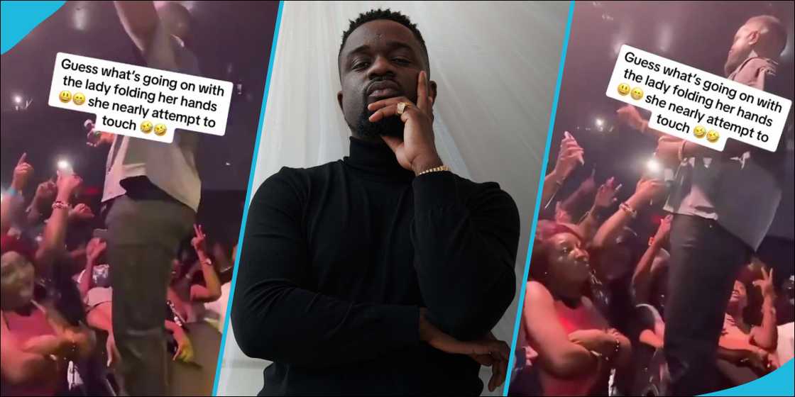 Lady folds arms during Sarkodie's performance in the US Lady folds arms during Sarkodie's performance in the US