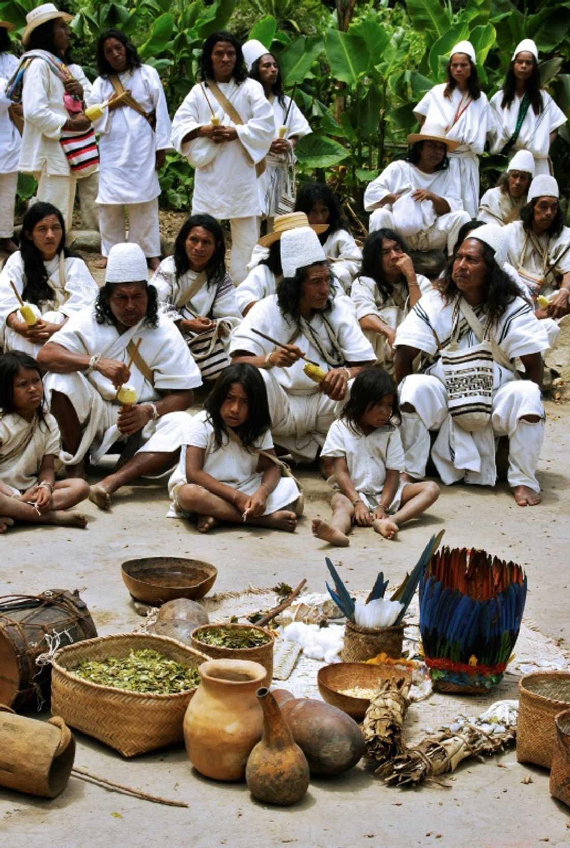 Members of the Arhuaco indigenous community carry out a ritual to honor nature and ask for forgiveness the damage caused by white people Members of the Arhuaco indigenous community carry out a ritual to honor nature and ask for forgiveness the damage caused by white people