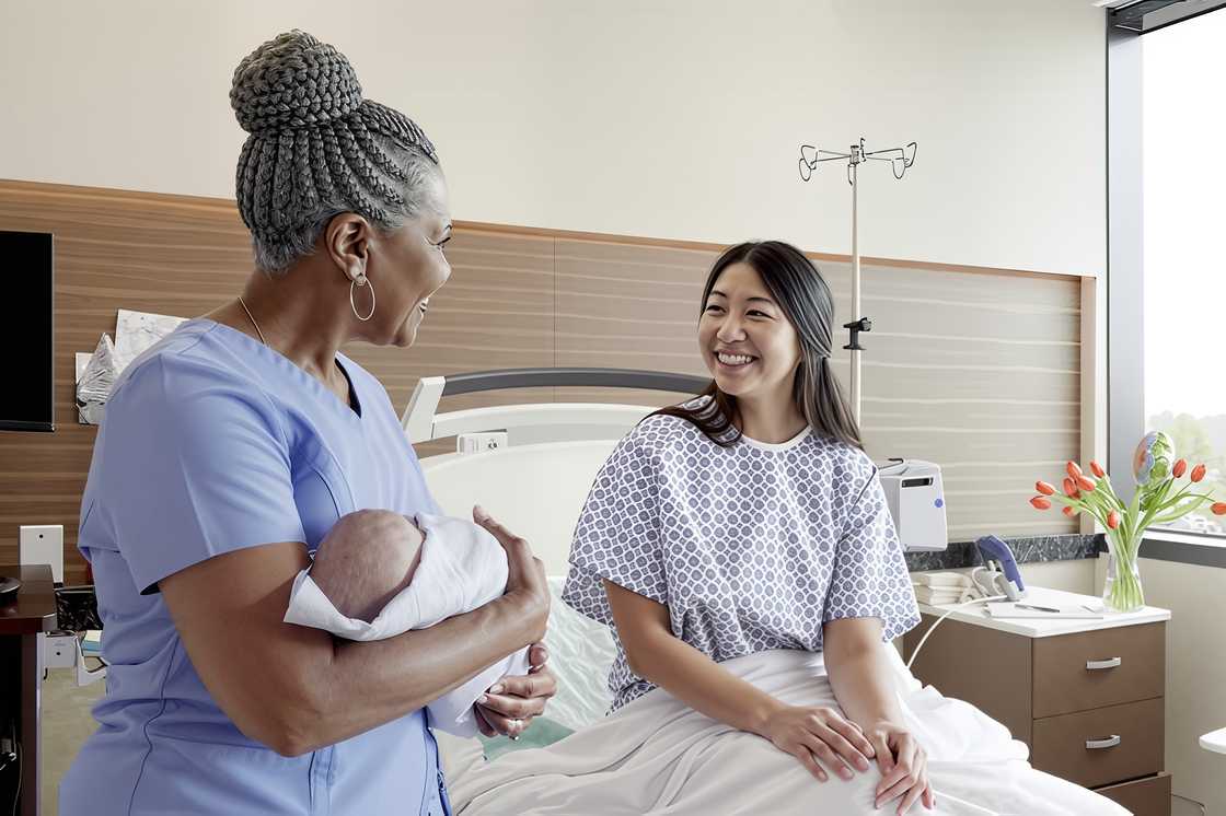 The pediatrician holds the baby