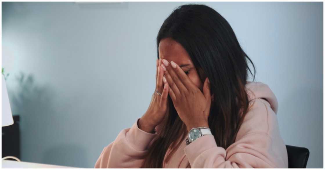 Photo of sad young lady regretting her action Photo of sad young lady regretting her action