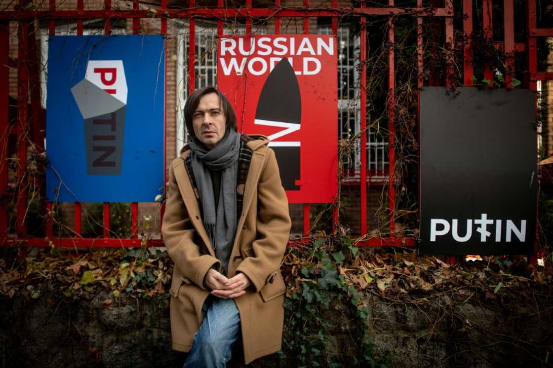 'I can be more useful doing what I am good at': Ukrainian graphic artist Mykola Kovalenko with some of his posters 'I can be more useful doing what I am good at': Ukrainian graphic artist Mykola Kovalenko with some of his posters