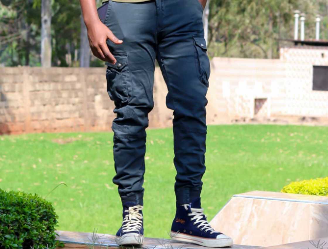 A man wearing a pair of cargo joggers