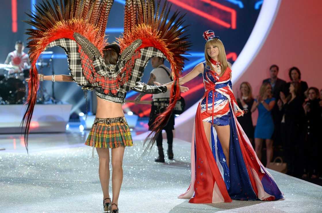 Superstar singer Taylor Swift (R) joined the Victoria's Secret fashion show runway extravaganza in 2013
