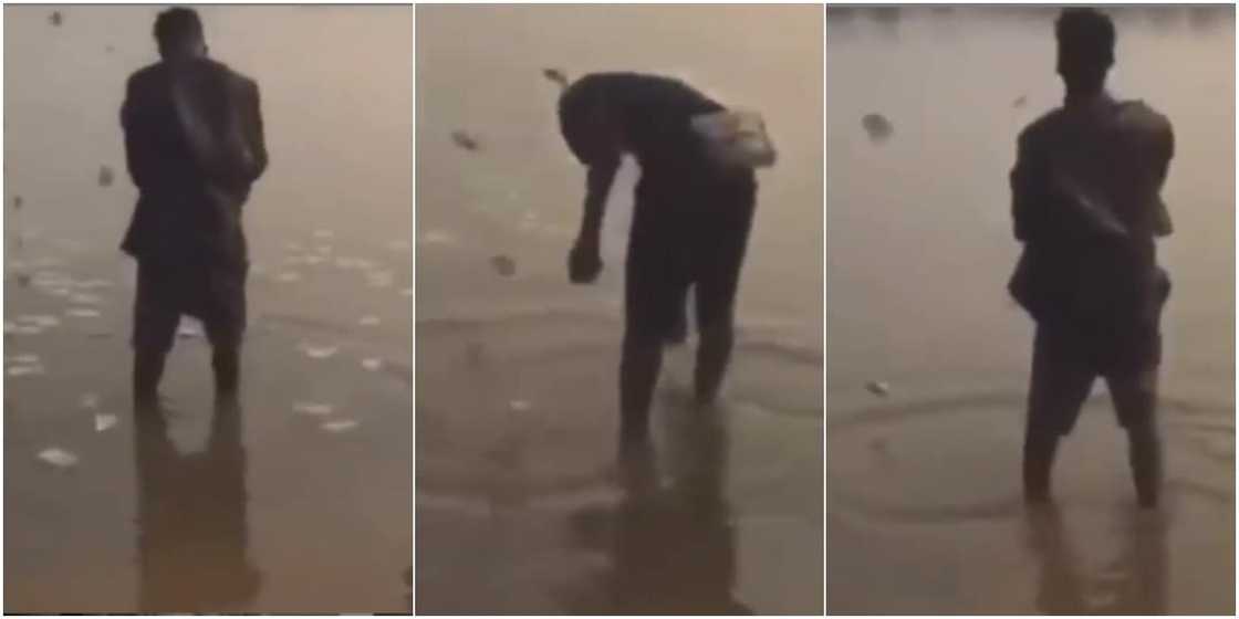 Video showing suspected internet fraudsters spraying bundles of money into river causes stir on social media Video showing suspected internet fraudsters spraying bundles of money into river causes stir on social media