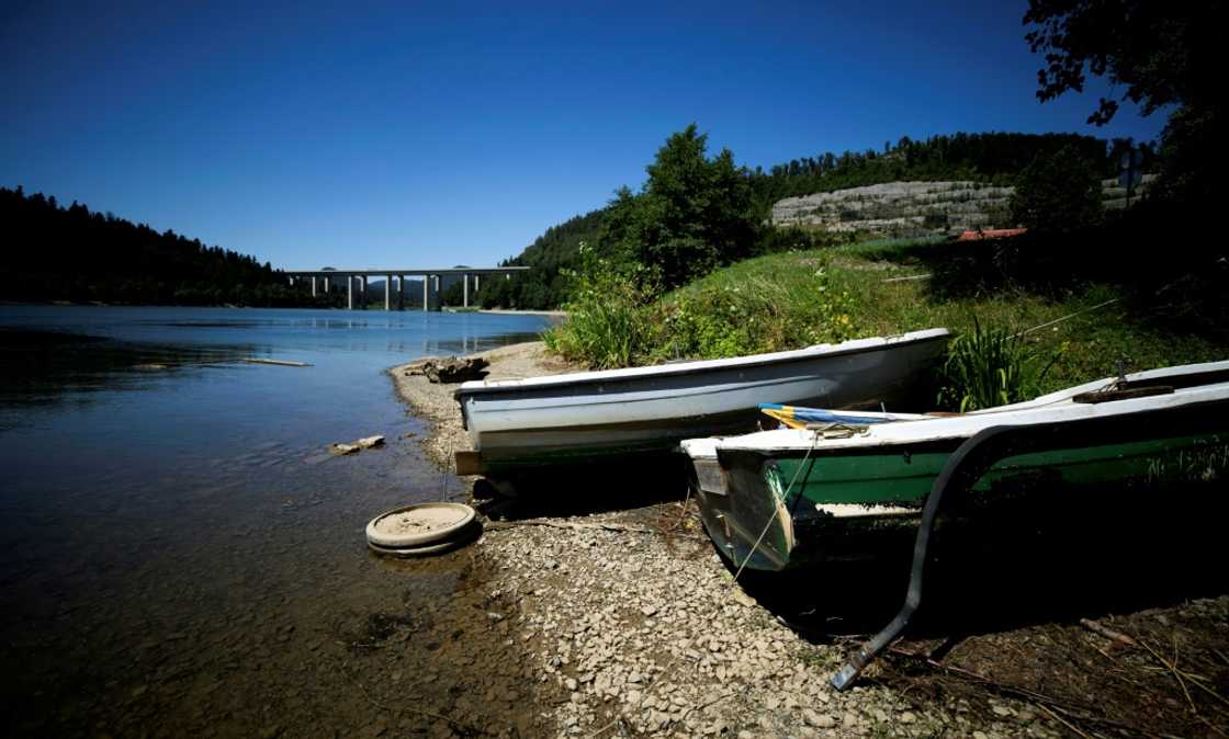 Small boats beached on the shores of lake Bajer, near the Croatian mountain village of Fuzine Small boats beached on the shores of lake Bajer, near the Croatian mountain village of Fuzine