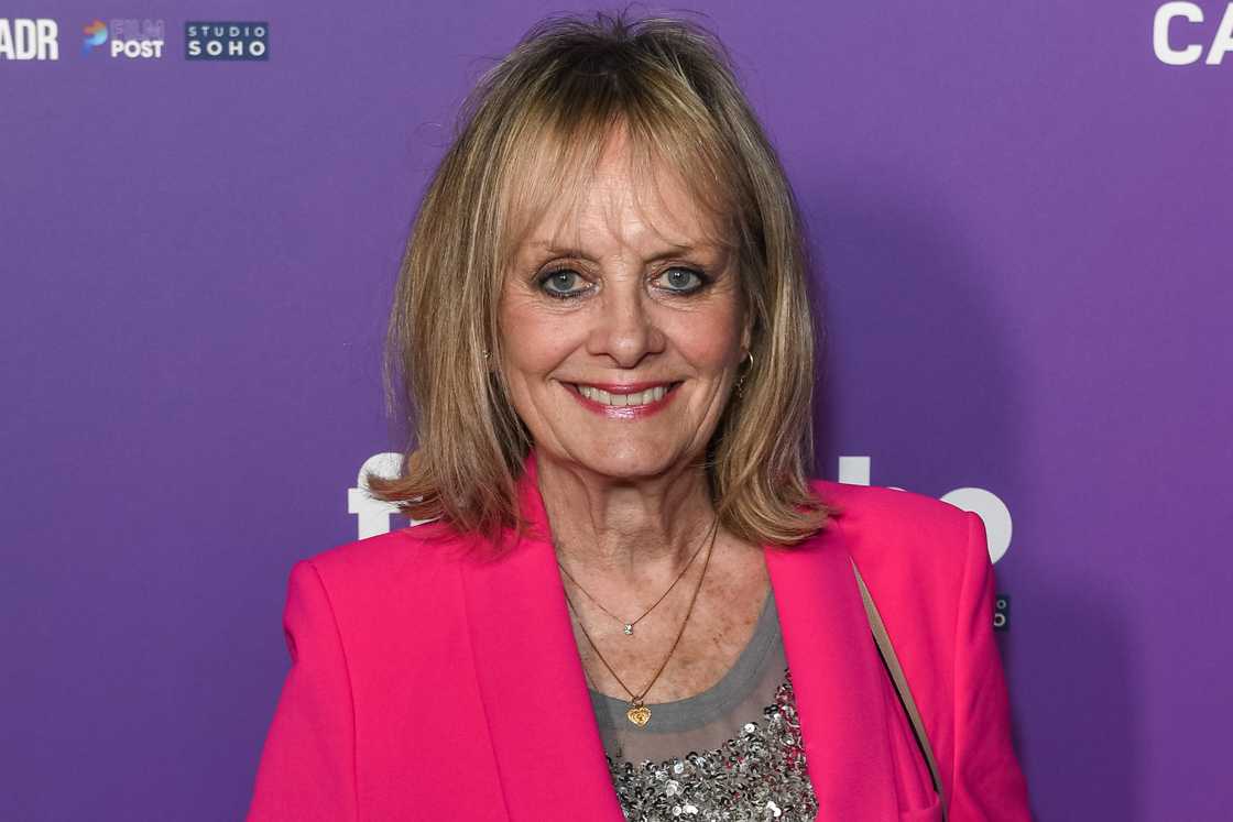 Twiggy poses in a purple background in Cannes, France Twiggy poses in a purple background in Cannes, France