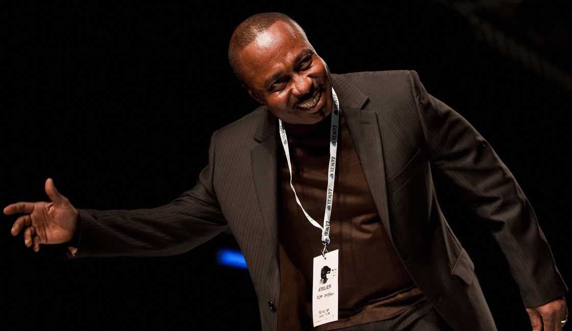 Ghanaian designer Kofi Ansah salutes at the end of his show Ghanaian designer Kofi Ansah salutes at the end of his show