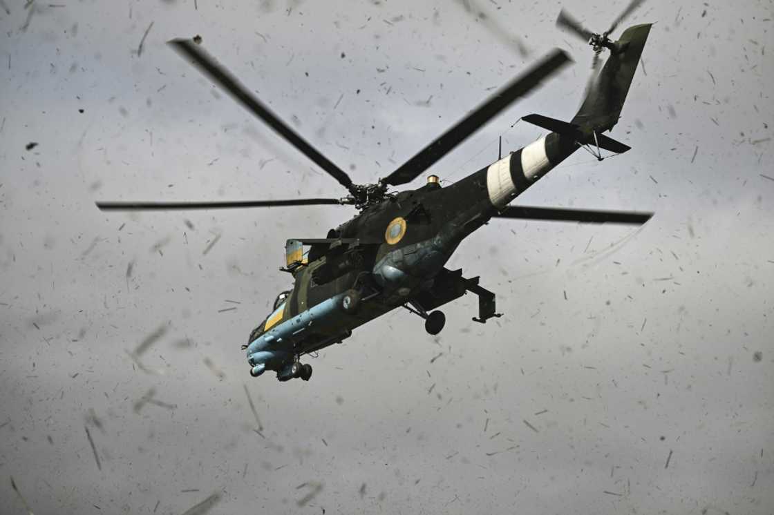 The Mi-24 attack helicopter is smaller than a Mi-8, more manoeuvrable and heavily armoured The Mi-24 attack helicopter is smaller than a Mi-8, more manoeuvrable and heavily armoured
