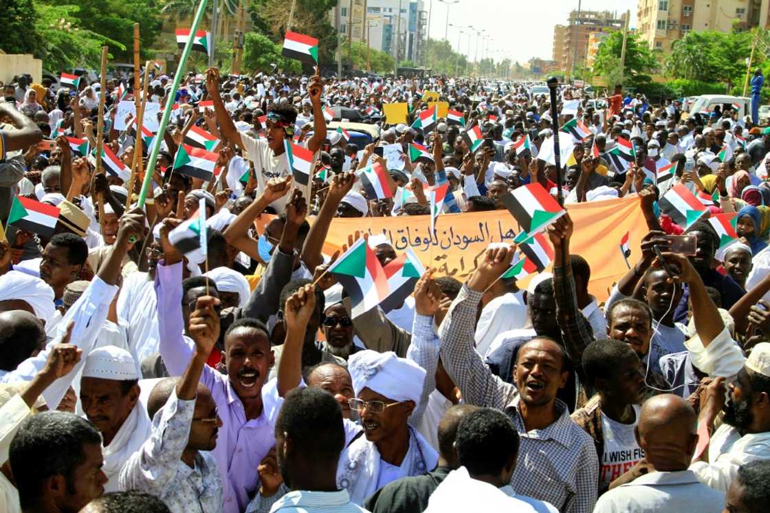 The crowd that gathered Saturday in front of the headquarters of the UN mission in Sudan chanted pro-Bashir slogans and burned photos of UN envoy Volker Perthes