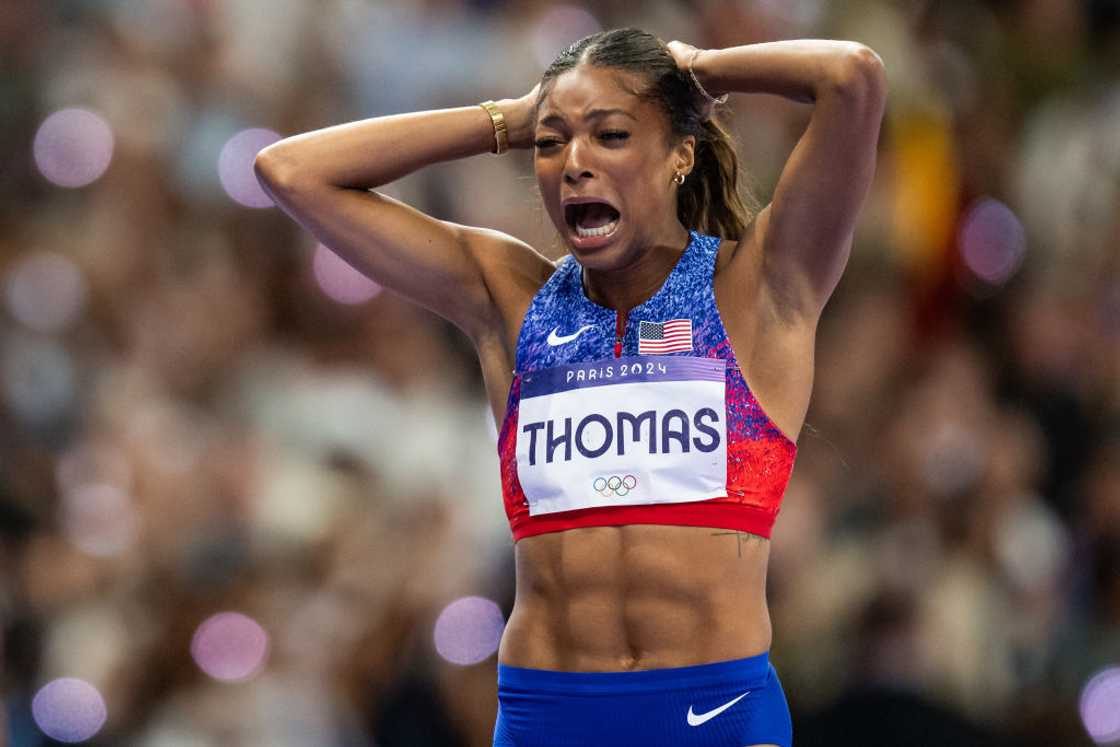 Gabby Thomas reacts after winning Olympic gold in the women's 200m. Gabby Thomas reacts after winning Olympic gold in the women's 200m.
