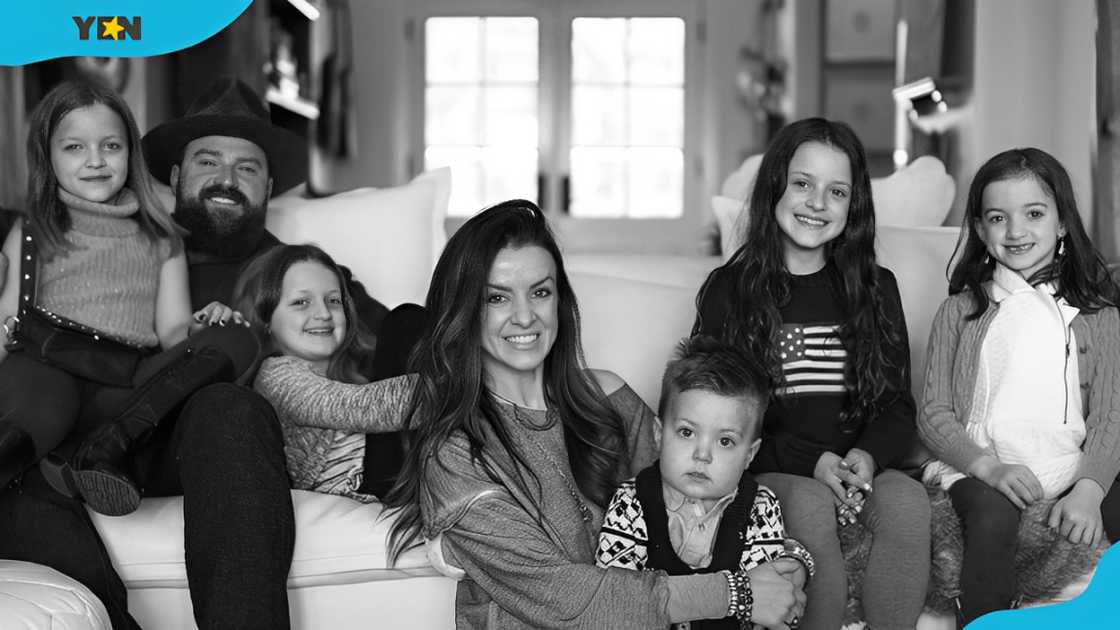 Zac Brown (L) and his ex-wife (M), along with their children, pose for a family photo