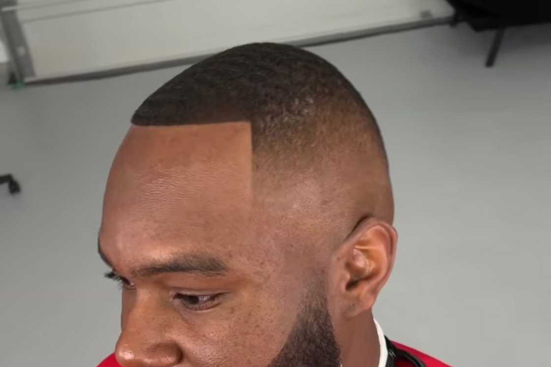 A man with a lovely buzz haircut A man with a lovely buzz haircut