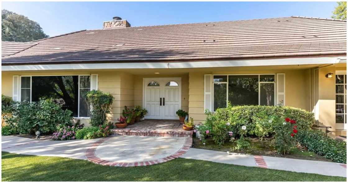 Kanye West buys the house right across the street from his marital home Kanye West buys the house right across the street from his marital home