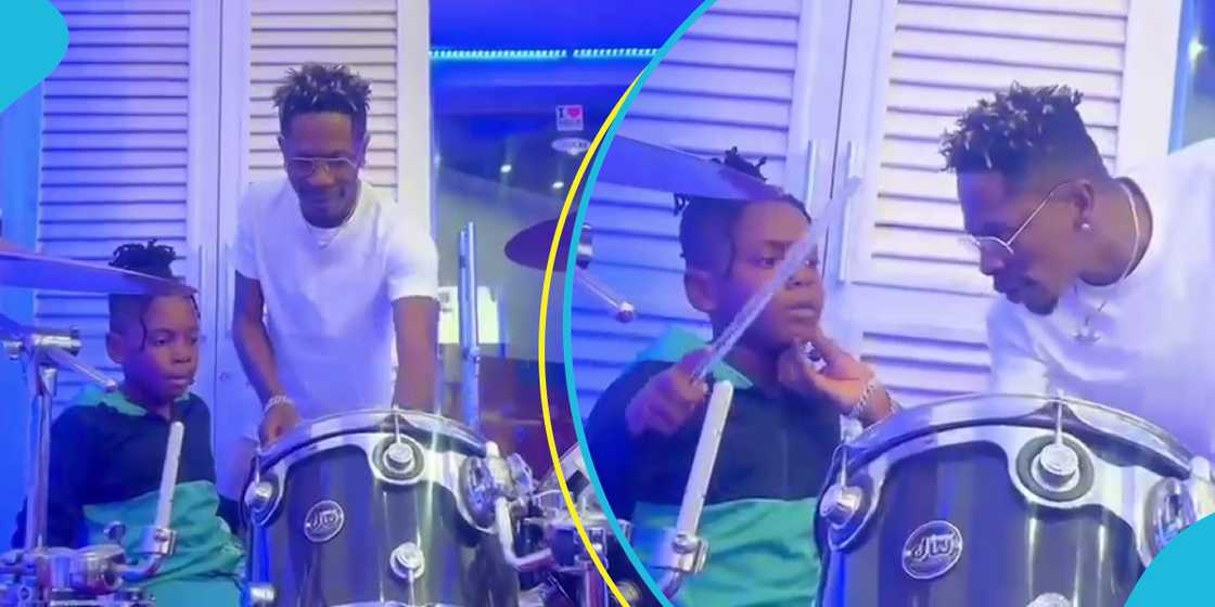 Shatta Wale and his son Majesty on the drums inside his plush mansion Shatta Wale and his son Majesty on the drums inside his plush mansion