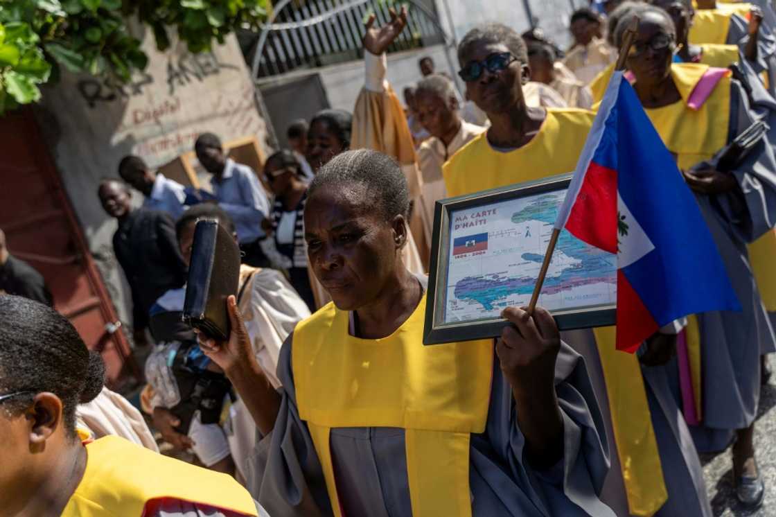Haitians take part in a protest in October 2022 denouncing the high levels of crime Haitians take part in a protest in October 2022 denouncing the high levels of crime