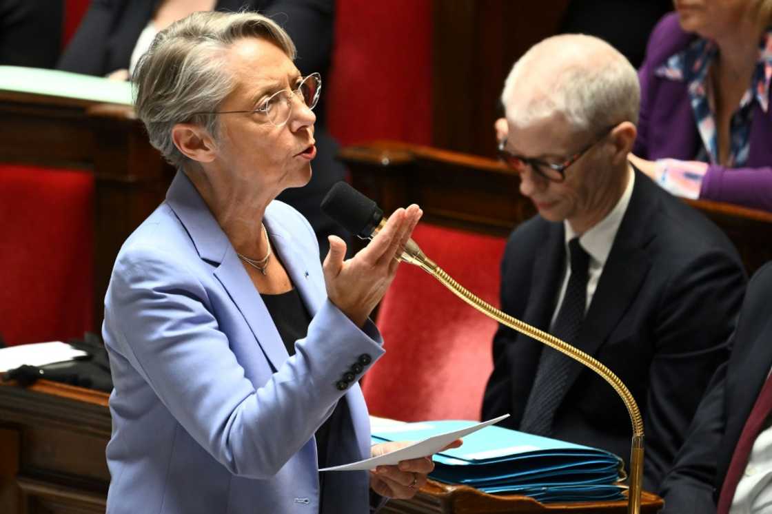 Macron said that Prime Minister Elisabeth Borne retained his confidence Macron said that Prime Minister Elisabeth Borne retained his confidence