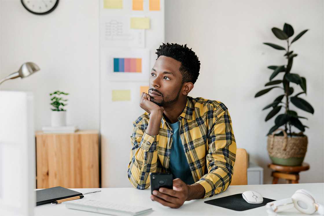 A young man is looking up A young man is looking up