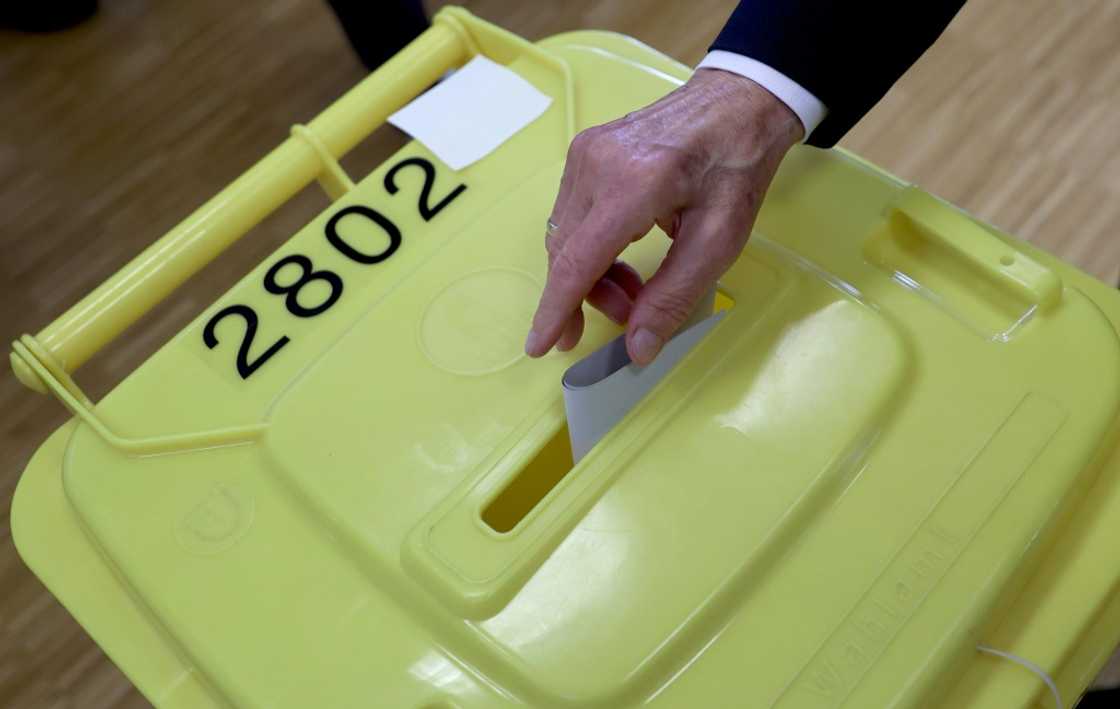 Surveys put Scholz's centre-left SPD slightly ahead of the conservative CDU of former chancellor Angela Merkel Surveys put Scholz's centre-left SPD slightly ahead of the conservative CDU of former chancellor Angela Merkel