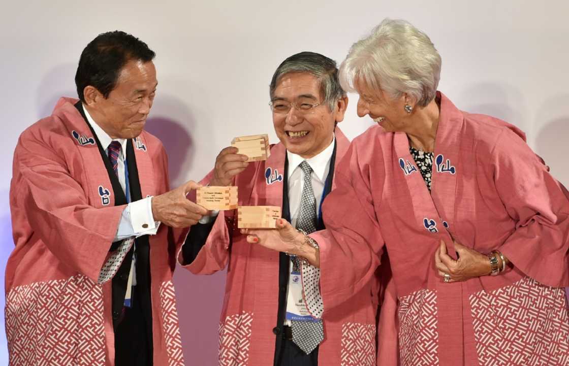 Outgoing Bank of Japan governor Haruhiko Kuroda (C) had both a strong network in Japan and an international profile Outgoing Bank of Japan governor Haruhiko Kuroda (C) had both a strong network in Japan and an international profile