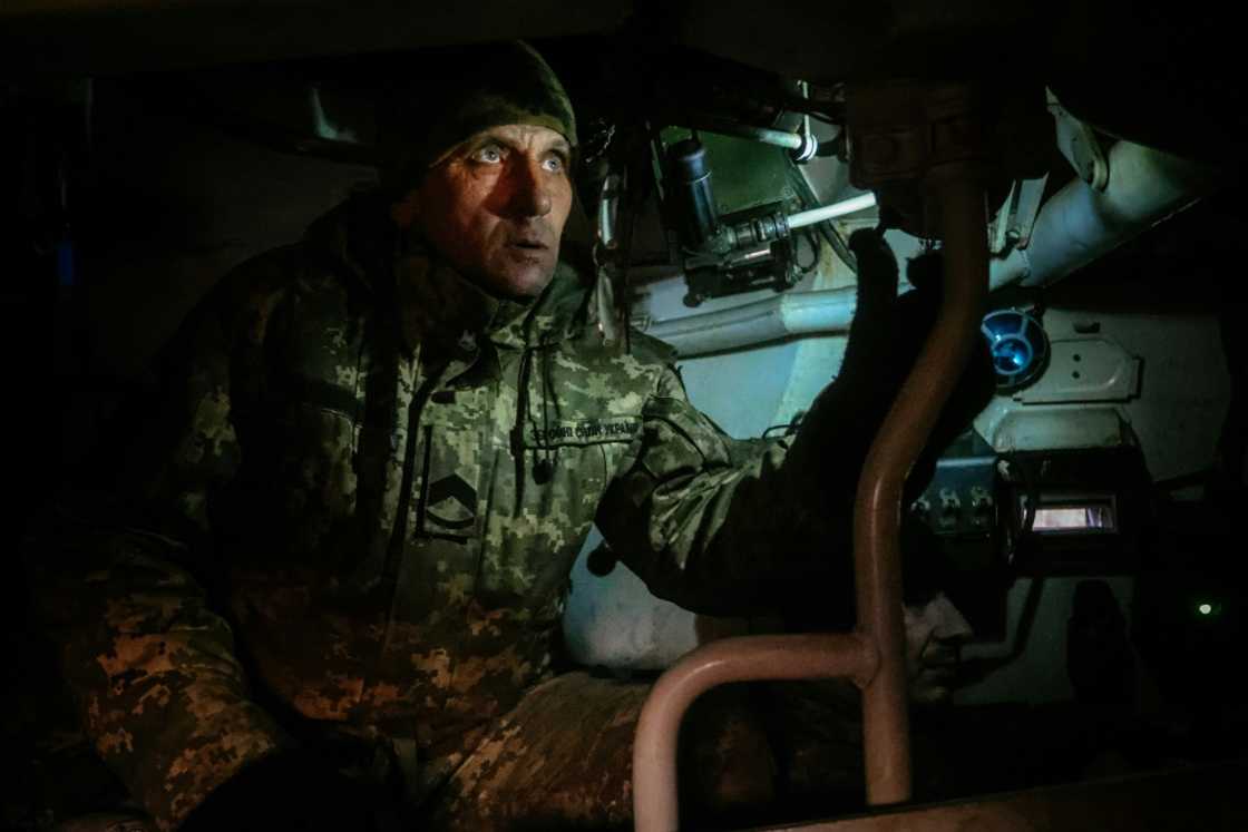 A Ukrainian artilleryman looking through a howtizer periscope towards Russian positions near an undisclosed frontline position in eastern Ukraine A Ukrainian artilleryman looking through a howtizer periscope towards Russian positions near an undisclosed frontline position in eastern Ukraine